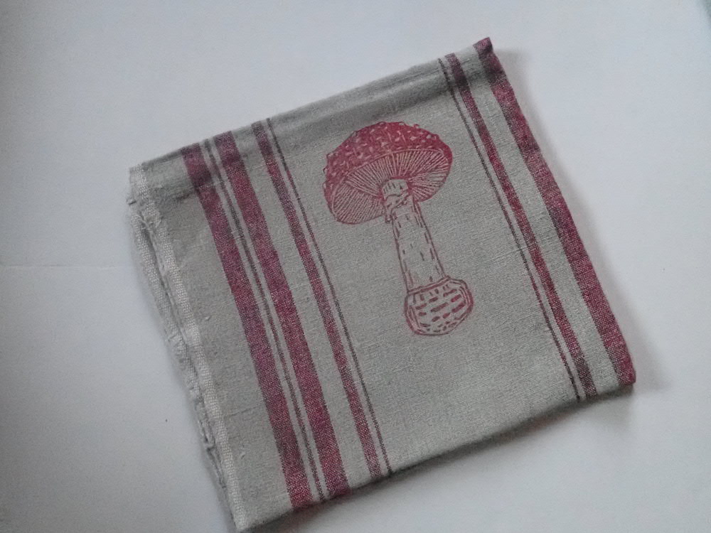 red amanita linen towel